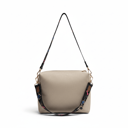 Laukun olkahihna - perhonen laukussa